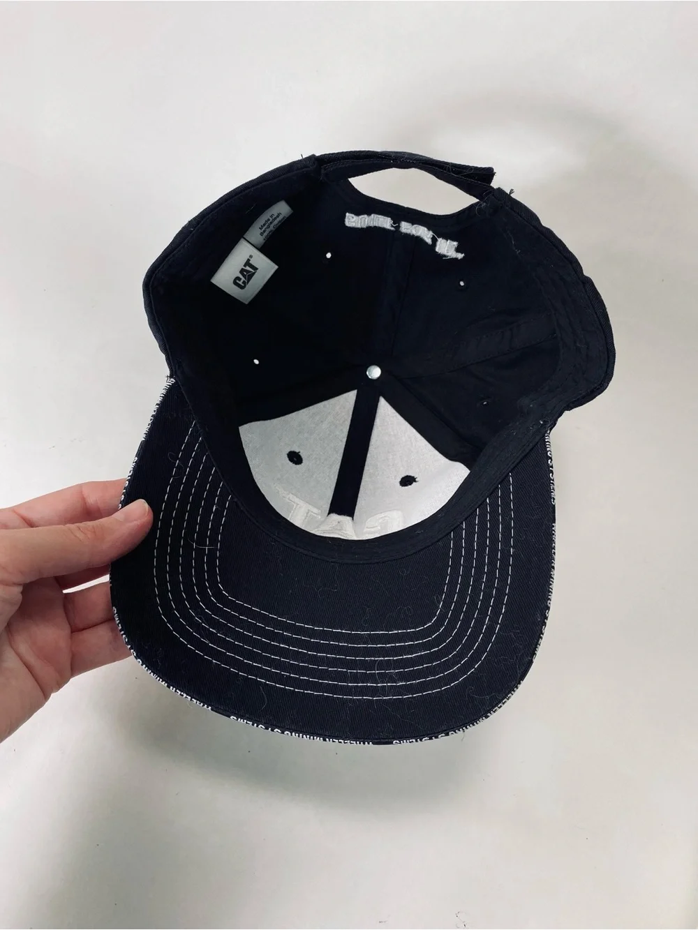 CAT Caterpillar Black Baseball Cap with White Logo and American Flag Patch